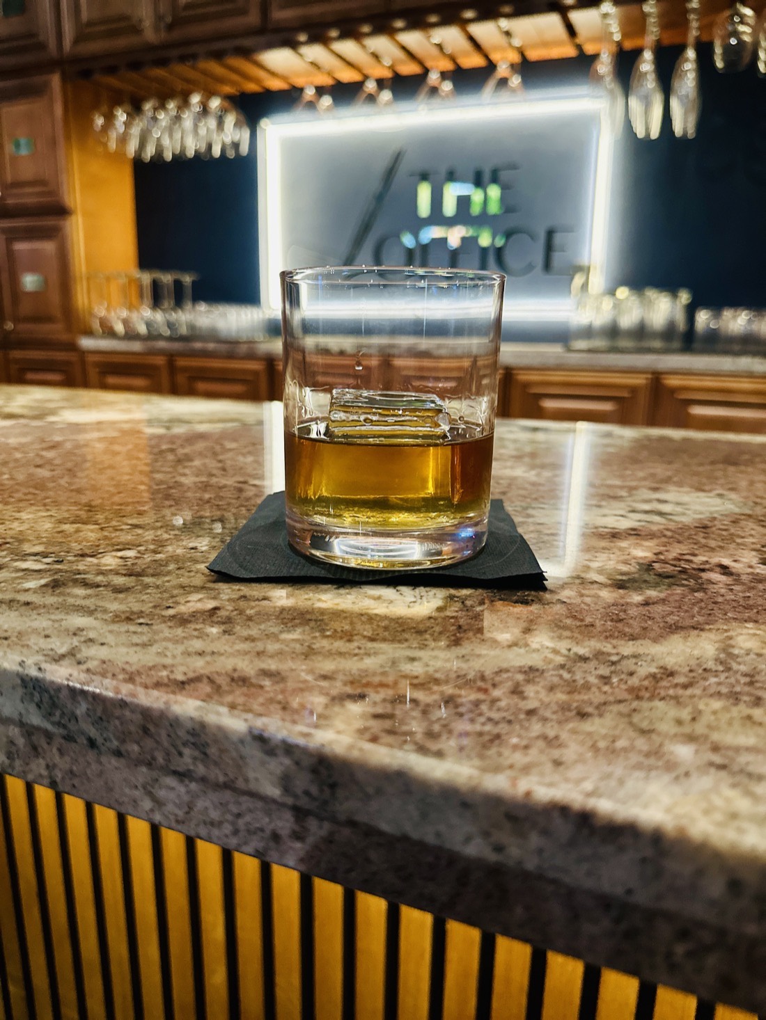 A bourbon poured at the bar, The Office private members club, North Palm Beach